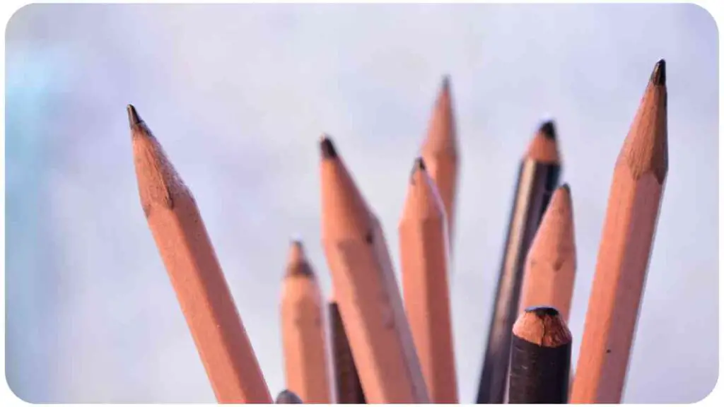 several pencils are sitting in a vase