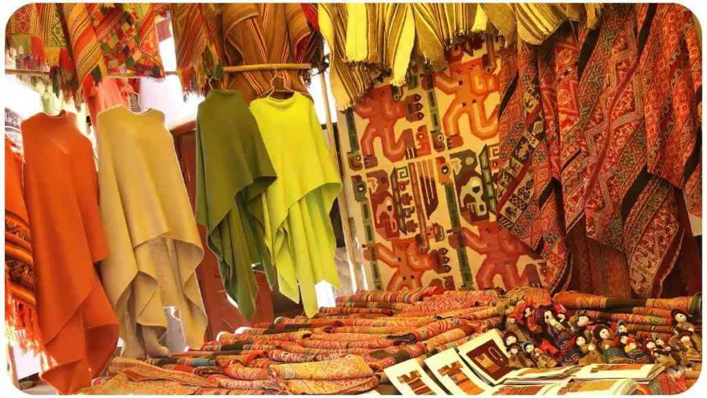 a display of clothing and other items for sale in a market