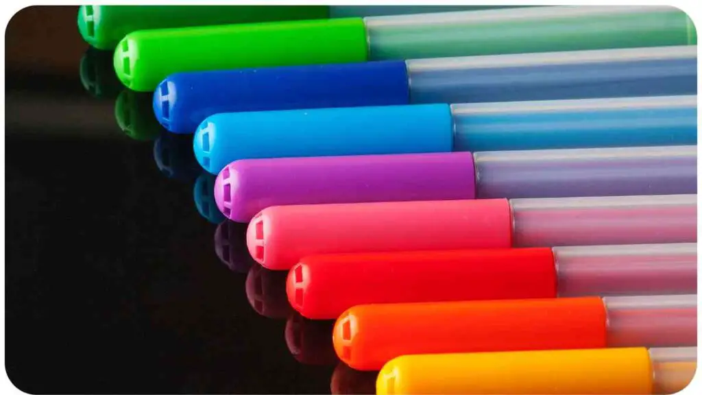 many different colored pens are lined up in a row